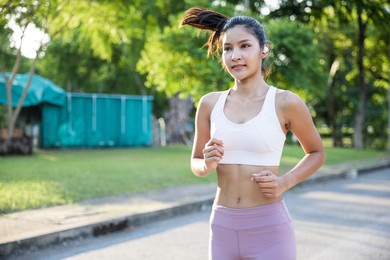 asian female sport girl in park