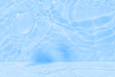 3d render of water bubbles frame in a blue swimming pool like setting with light glares