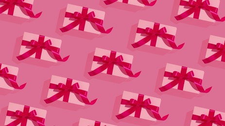 pattern of gift boxes on pink background. high quality photo
