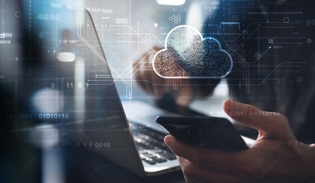 cloud technology. data storage and backup. networking and internet service concept. man using laptop computer and mobile phone with cloud computing diagram.