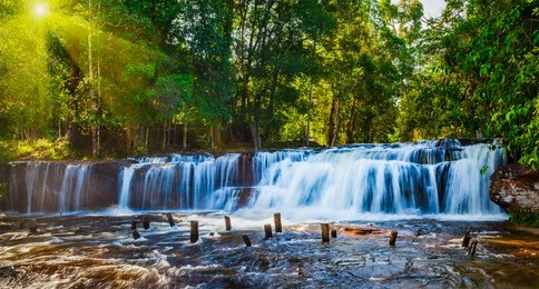 tropical waterfall phnom kulen on sunrise, cambodia