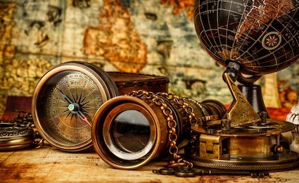 vintage grunge still life. vintage items on ancient map.