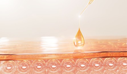 serum and vitamin drop on skin cell.
serum through the skin layer and reduce up saggy skin of the skin cell. 3d rendering.  