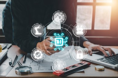 artificial intelligence ai, person hand holding holographic brain artificial intelligence (ai) icon from the screen, internet of things iot concept.