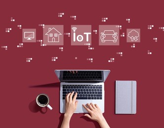 iot theme with person using a laptop computer