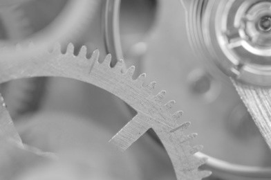   black white background with metal cogwheels a clockwork.  for your successful business design. macro.