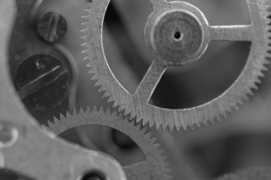   black white background with metal cogwheels a clockwork.  for your successful business design. macro.