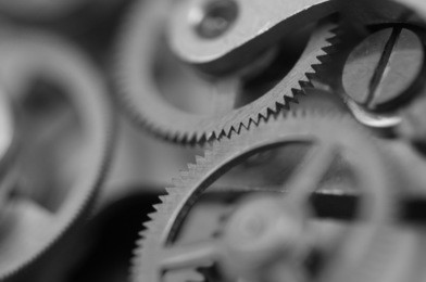 black white background with metal cogwheels a clockwork.  for your successful business design. macro.