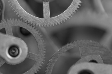 black white background with metal cogwheels a clockwork.  for your successful business design. macro.