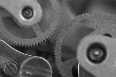 black white background with metal cogwheels a clockwork.  for your successful business design. macro.