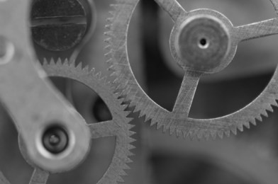 black white background with metal cogwheels a clockwork.  for your successful business design. macro.