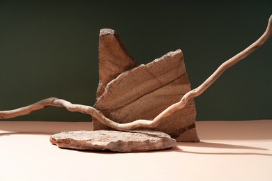 composition empty podium material tree stone dry flowers. product presentation. background beige green. beautiful background from natural materials