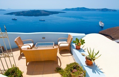 cosy patio with flowers in fira town on the island of thera(santorini), greece.