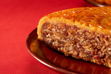 a close-up of a slice of cantonese traditional five-kernel mooncake