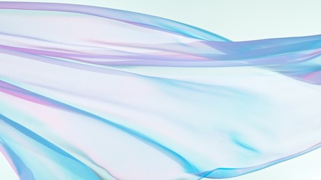 pastel color transparent silk fabric flowing by wind, freeze motion