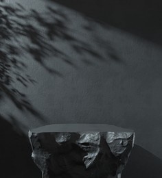 3d rendering mockup empty black rock podium display shelves, sunshade shadow tree on concrete cement wall, abstract background