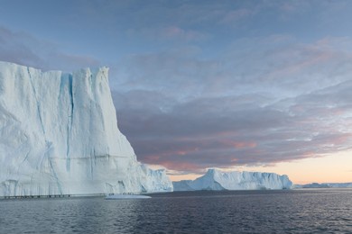climate change and global warming. icebergs from a melting glacier in greenland. the icy landscape of the arctic nature in the unesco world heritage site. summer season