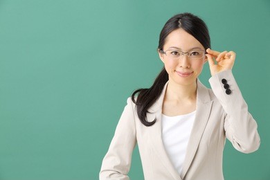 attractive teacher or student at the blackboard