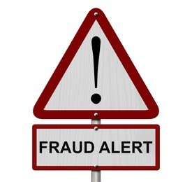 fraud alert caution sign, red and white triangle caution sign with words fraud alert isolated on a white background