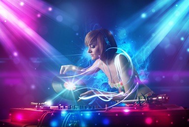 energetic dj girl mixing music with powerful light effects