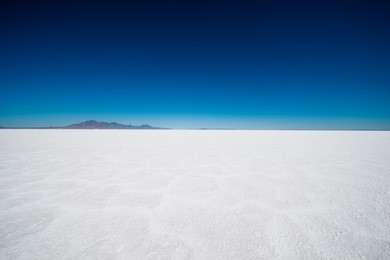 salt flats in utah. salt flats landscape. dark blue sky and snow white salt soil. boneville near salt lake city, utah, united states. bonneville salt flats
