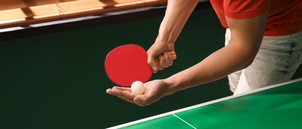 man playing ping pong indoors, closeup view. banner design
