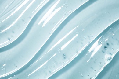 water gel cosmetic serum, hair care or beauty calming gel smudge abstract background
