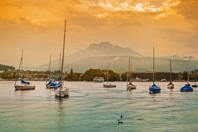 yachts in lucerne at sunset, switzerland
