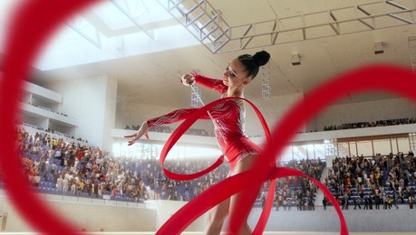 rhythmic gymnast in professional arena.