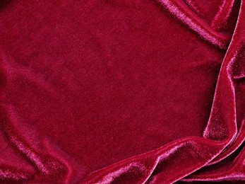 red velvet fabric texture used as background. empty red fabric background of soft and smooth textile material. there is space for text.