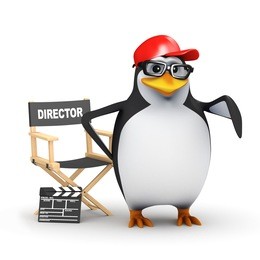 3d render of a penguin with his directors chair and clapperboard