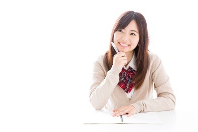 young asian student studying on white background