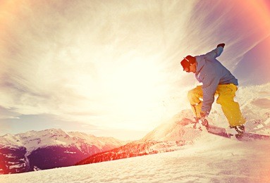 young man snowboarding.
