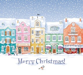 old historical houses, shops and cafe at the snow-covered city street under snowfall