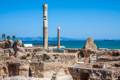 ancient ruins at carthage, tunisia with the mediterranean sea in the background