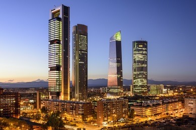 madrid, spain financial district skyline at twilight.