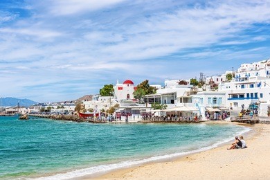 typical whitewashed homes along the port area in mykonos, greece, europe