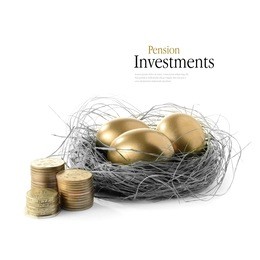 golden goose eggs placed in a authentic looking grass nest against a white background with the image coloured bronze and greyscale. concept image for pension savings and investments. copy space.