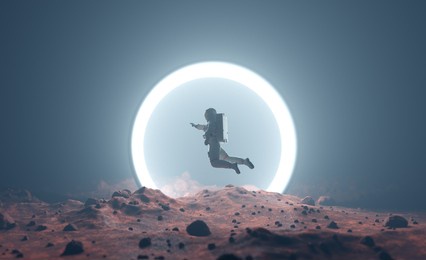astronaut on alien planet entering spacetime portal light. science fiction universe exploration. 3d render
