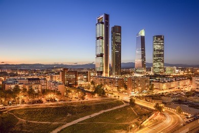 madrid, spain financial district skyline at twilight.
