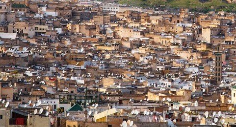 fes, morocco - march 3: satellite dishes on the roofs of fes on march 3, 2013. satellite tv in morocco.