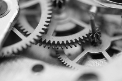 black white background with metal cogwheels a clockwork. conceptual photo for your successful business design. macro. 