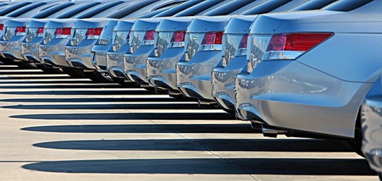 shiny cars standing on parking lot
