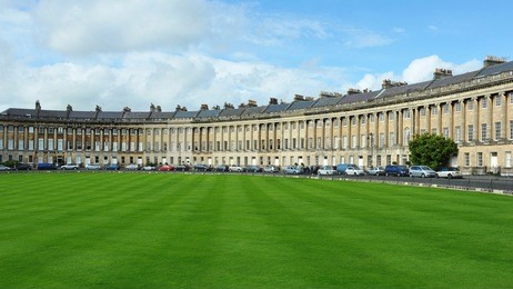 view of the landmark royal crescent seen from victoria park in bath in somerset england