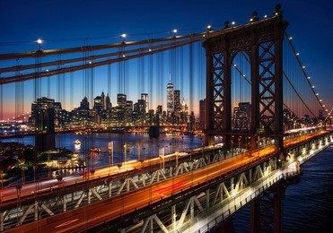 new york city - beautiful sunset over manhattan with manhattan and brooklyn bridge
