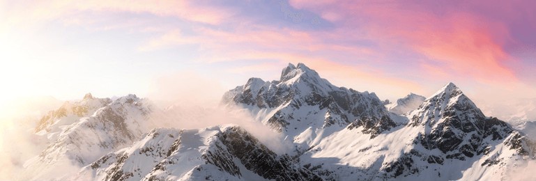aerial view from airplane of snow covered canadian mountain landscape in winter. colorful pink sky art render. near squamish, north of vancouver, british columbia, canada.