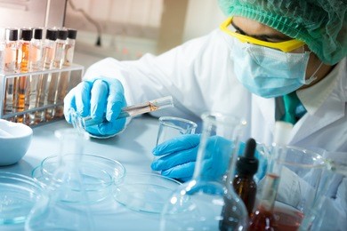 a researcher working in the laboratory.