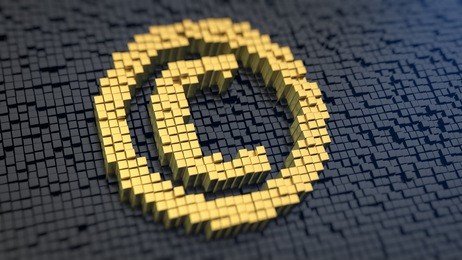 copyright symbol of the yellow square pixels on a black matrix background. author rights concept.