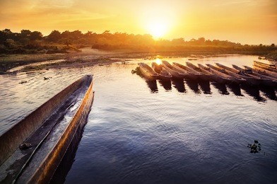canoeing safari on the rapti river in chitwan national park, nepal