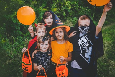 children celebrate halloween dressed up in costumes. selective focus. kids.